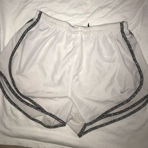 White Nike running shorts